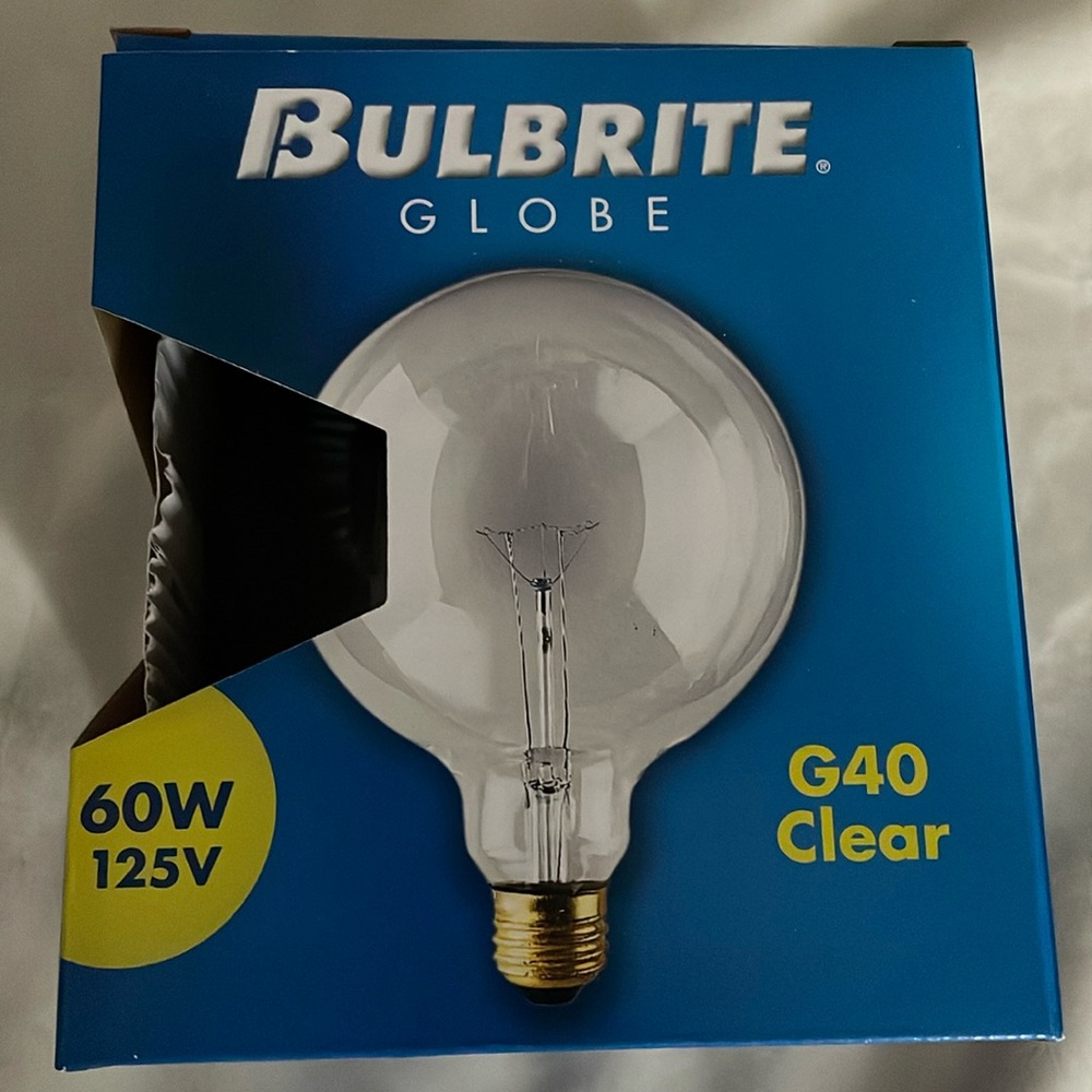 Brand New 5” diameter light bulb. 60W 125V in perfect condition
